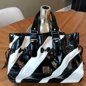 Dooney and Bourke black and white hand bag.